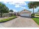 Single-Gathering home with 2-car garage and beautifully landscaped yard at 8678 Sw 83Rd Cir, Ocala, FL 34481