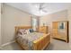 Cozy bedroom with light wood furniture and plenty of closet space at 8678 Sw 83Rd Cir, Ocala, FL 34481