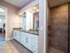 Elegant bathroom with double vanity and large shower at 1719 Sw 27Th Pl, Ocala, FL 34471