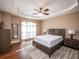 Main bedroom with hardwood floors and a ceiling fan at 1719 Sw 27Th Pl, Ocala, FL 34471