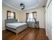 Bright bedroom featuring hardwood floors and ample closet space at 1719 Sw 27Th Pl, Ocala, FL 34471