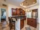 Open kitchen with breakfast bar and stainless steel appliances at 1719 Sw 27Th Pl, Ocala, FL 34471