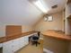 Upstairs office features built-in desks and cabinets, providing ample workspace at 1719 Sw 27Th Pl, Ocala, FL 34471