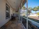 Spacious screened-in porch, perfect for relaxing outdoors at 1719 Sw 27Th Pl, Ocala, FL 34471