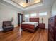 Spacious bedroom with hardwood floors and large windows at 1719 Sw 27Th Pl, Ocala, FL 34471