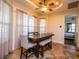 Bright breakfast nook with a table and chairs, adjacent to the kitchen at 1719 Sw 27Th Pl, Ocala, FL 34471