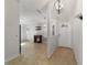 View of the entryway, showing access to the living room and kitchen at 9145 Sw 90Th St, Ocala, FL 34481