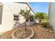 Bright courtyard with brick pavers, landscaping, and a small tree at 9145 Sw 90Th St, Ocala, FL 34481