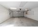Garage with overhead door and ample storage at 9145 Sw 90Th St, Ocala, FL 34481