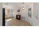 Kitchen and dining area with light tile floors and neutral colors at 9145 Sw 90Th St, Ocala, FL 34481