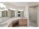Large bathroom with double vanity and shower stall at 9145 Sw 90Th St, Ocala, FL 34481