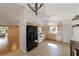 Well-lit kitchen featuring ample cabinetry and black appliances at 9145 Sw 90Th St, Ocala, FL 34481