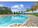 Resort-style pool with a large deck and shaded areas at 3396 Nw 55Th Ct, Ocala, FL 34482