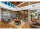 Bright dining area with multiple tables and wine wall at 3396 Nw 55Th Ct, Ocala, FL 34482