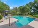 Inviting pool with a spa and lush landscaping at 1923 Se 7Th St, Ocala, FL 34471