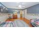 Bedroom with twin beds and hardwood floors at 1923 Se 7Th St, Ocala, FL 34471