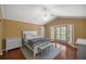 Bright bedroom with bay window, hardwood floors, and ceiling fan at 2811 Se 14Th St, Ocala, FL 34471
