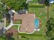 Bird's eye view showcasing home's layout, pool, and surrounding landscape at 2811 Se 14Th St, Ocala, FL 34471