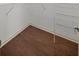 Large walk-in closet with wire shelving and hardwood floors at 2811 Se 14Th St, Ocala, FL 34471