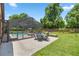 Spacious patio with seating area and pool access at 2811 Se 14Th St, Ocala, FL 34471