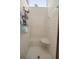 Clean shower with tiled walls and built-in seat at 2811 Se 14Th St, Ocala, FL 34471