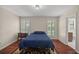 Cozy bedroom with hardwood floors, plenty of natural light and en-suite bathroom at 2811 Se 14Th St, Ocala, FL 34471