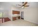 Bright kitchen with built-in desk and access to sunroom at 2811 Se 14Th St, Ocala, FL 34471