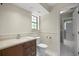 Bathroom with single sink vanity and toilet at 2811 Se 14Th St, Ocala, FL 34471