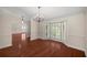 Spacious dining room featuring hardwood floors and a bay window at 2811 Se 14Th St, Ocala, FL 34471