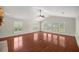 Living area with hardwood floors and large windows at 2811 Se 14Th St, Ocala, FL 34471