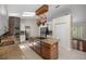 Well-equipped kitchen with granite counters and a brick accent wall at 2811 Se 14Th St, Ocala, FL 34471