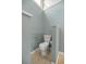 Simple toilet in a small, well-lit bathroom at 2811 Se 14Th St, Ocala, FL 34471