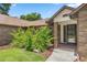 Brick home entrance with front door and landscaping at 2811 Se 14Th St, Ocala, FL 34471