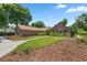Spacious brick home with lush landscaping and a driveway at 2811 Se 14Th St, Ocala, FL 34471