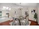 Dining room with hardwood floors and a chandelier at 2811 Se 14Th St, Ocala, FL 34471