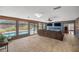 Bright Gathering room with pool view, comfortable seating and large screen TVs at 2811 Se 14Th St, Ocala, FL 34471