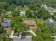 Aerial view of home with pool, landscaping, and large lot at 2811 Se 14Th St, Ocala, FL 34471