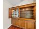 Built-in wet bar with glass shelving and sink at 2811 Se 14Th St, Ocala, FL 34471