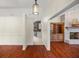Open living area with hardwood floors and built-in shelving at 2811 Se 14Th St, Ocala, FL 34471
