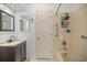 Bathroom with tub, shower, and dark brown vanity at 2811 Se 14Th St, Ocala, FL 34471