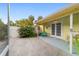 Charming back patio with seating area and lush landscaping at 1226 Se 9Th Ave, Ocala, FL 34471