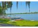 Peaceful waterfront with boats and picnic tables at 25235 Ne 142Nd Ne Ln # Lot 185, Salt Springs, FL 32134