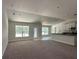 Open kitchen with island and stainless steel appliances at 11600 Sw 55Th Ave, Ocala, FL 34476