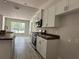 Open kitchen with stainless steel appliances and ample counter space at 11600 Sw 55Th Ave, Ocala, FL 34476