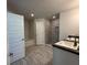 Bathroom with a soaking tub, walk-in shower, and double vanity at 11600 Sw 55Th Ave, Ocala, FL 34476