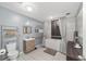 Clean bathroom with a soaking tub and walk-in shower at 5240 Se 17Th St, Ocala, FL 34471