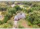 Aerial view of a home with pool and lush landscaping at 5240 Se 17Th St, Ocala, FL 34471