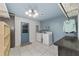 Bright laundry room with washer, dryer, and storage at 5240 Se 17Th St, Ocala, FL 34471