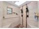Spa-like bathroom with double shower heads and a built-in bench at 5240 Se 17Th St, Ocala, FL 34471