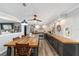 Modern kitchen with stainless steel appliances and a large wood island at 5240 Se 17Th St, Ocala, FL 34471